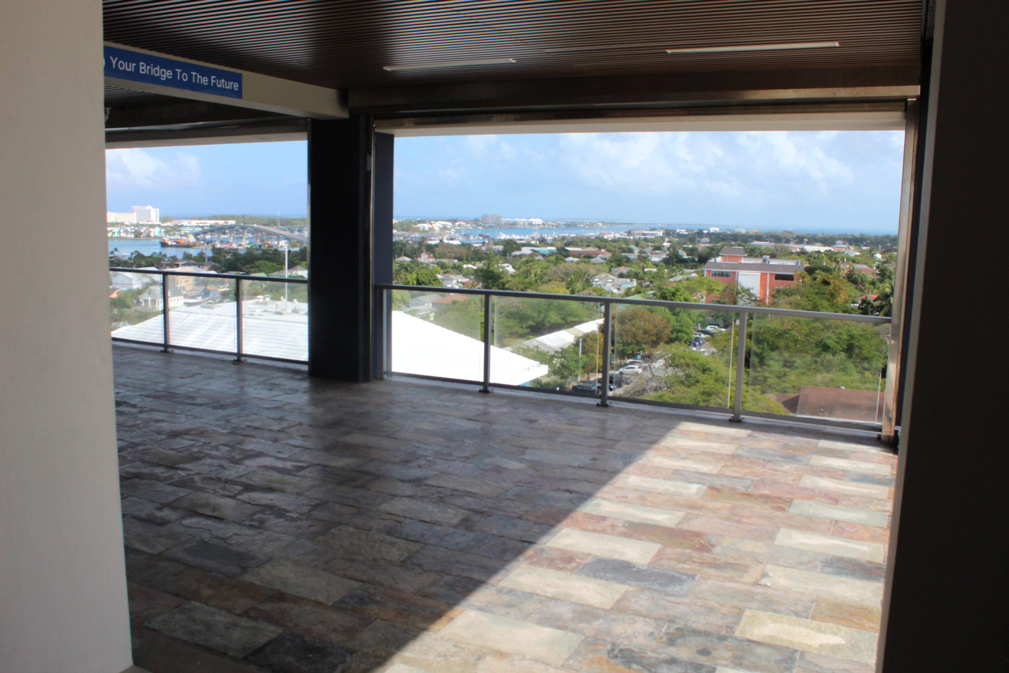 Spacious terrace with scenic city and nature views.